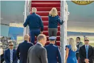  ?? Gemunu Amarasingh­e/Associated Press ?? President Joe Biden and first lady Jill Biden board Air Force One on Saturday at Andrews AFB, Md., heading to London for Queen Elizabeth II’s funeral.