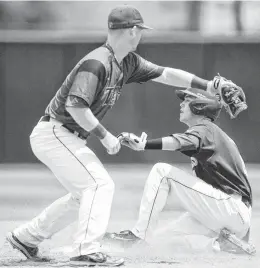  ??  ?? Arizona State second baseman Andrew Snow slides into second base during the Sun Devils’ home game against Tennessee Tech on Sunday. Snow went 2 for 4 with two runs and one RBI.