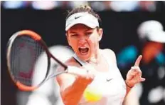  ?? AFP ?? Romania’s Simona Halep during her 6-1, 6-0 demolition of Japan’s Naomi Osaka at Italian Open yesterday.