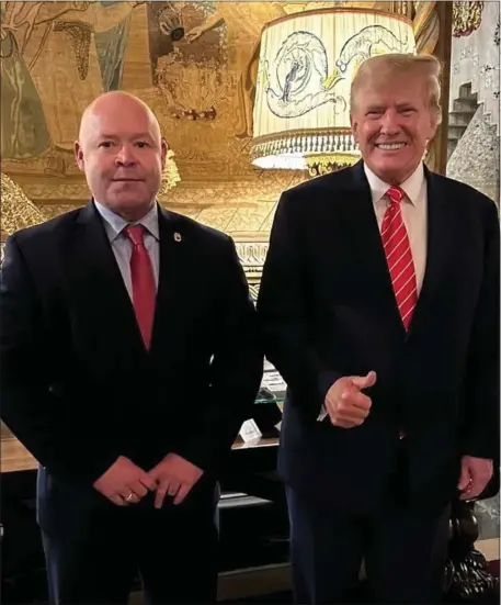  ?? COURTESY — TEAMSTERS SOCIAL MEDIA ?? Former President Donald Trump and Teamsters boss Sean O’Brien stand for a photo during a meeting between the pair on Wednesday.