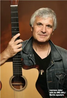  ??  ?? Laurence Juber with his OMC-18VLJ Martin signature