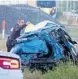  ?? JOE CAVARETTA/ORLANDO SENTINEL ?? A car was left mangled near train tracks at 21490 Dixie Highway in Miami Dade after it hit a Brightline train on Thursday in Aventura.