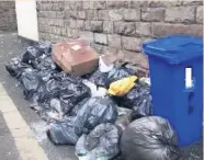  ??  ?? ● Rubbish dumped at Greenfield Street in Haslingden