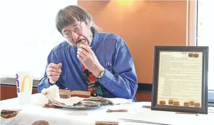  ?? USA TODAY NETWORK-WISCONSIN ?? Don Gorske of Fond du Lac eats his 30,000th Big Mac sandwich May 4, 2018, at the Military Road McDonald’s in Fond du Lac.