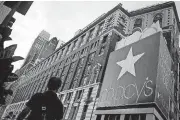  ?? [BLOOMBERG PHOTO BY JOHN TAGGART] ?? A pedestrian walks past a Macy’s store in New York.