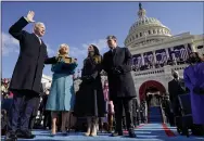  ?? THE ASSOCIATED PRESS ?? Joe Biden is sworn in as the 46th president of the United States on Wednesday at the Capitol by Chief Justice John Roberts as Jill Biden holds the Bible. Biden has big plans as he faces big problems.