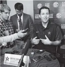  ?? THE ASSOCIATED PRESS ?? Vandy basketball coach Bryce Drew, shown above during SEC media day, will try to lead the Commodores back to the NCAA tournament.