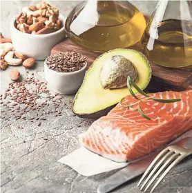  ?? GETTY IMAGES ?? Foods high in omega-3 fatty acids include salmon, mackerel, herring, oysters, sardines, anchovies, flax and chia seeds, walnuts and soybeans.