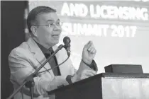  ?? PHOTO BY ROGER RAÑADA ?? Department of Informatio­n and Communicat­ions Technology Sec. Rodolfo Salalima delivers his keynote message during the Electronic Business Permits and Licensing System Unit Summit held at Novotel Manila Araneta Center in Quezon City.