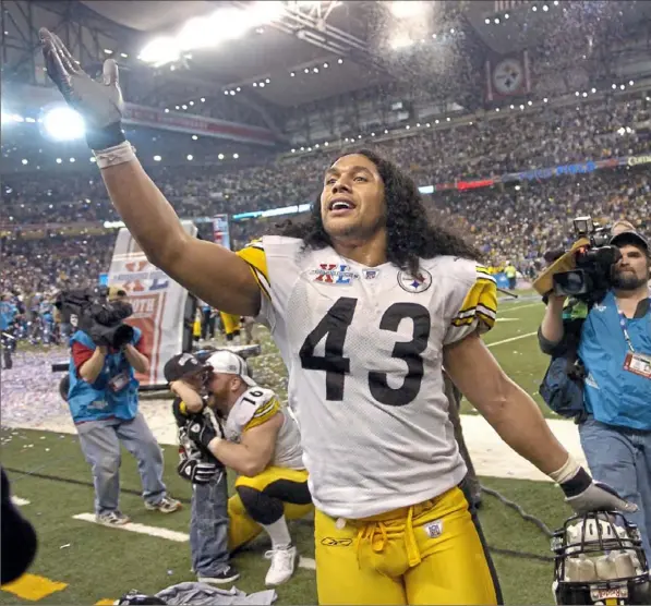  ?? Matt Freed/Post-Gazette ?? Steelers Troy Polamalu looks for his family in the stands after defeating the Seahawks in Super Bowl XL on Feb. 5, 2006.