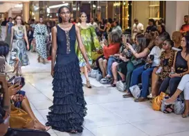  ?? ?? A model presents a creation by fashion brand Kreyann' during the African Fashion Internatio­nal fashion week