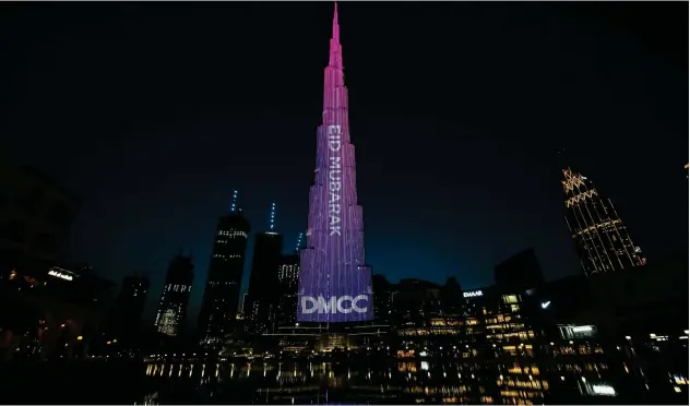  ??  ?? ↑
DMCC lights up the iconic Burj Khalifa with an Eid Mubarak message to the nation.