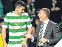  ??  ?? Brendan Rodgers with Tom Rogic in midweek.