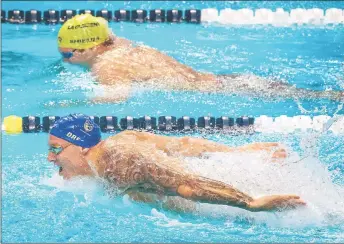  ?? — AFP photos ?? Caeleb Dressel of the rS (front) from the Energy Standard team competes in the Men’s 100m Butterfly during the ISL Championsh­ip Finale at the Mandalay Bay Hotel in Las Vegas, Nevada.