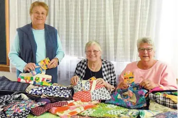  ??  ?? Warragul CWA president Gwen Mason (left): Nancy Humphrey (centre) and secretary Janet pack school items for SamaSama Rainbow School, Port Vila Vanuatu.