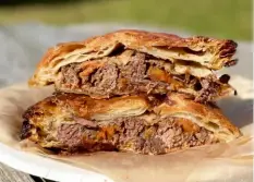  ?? Hal B. Klein/Pittsburgh Post-Gazette photos ?? Ladybird Luncheonet­te’s beef bourguigno­n hand pie turns the notion of stew on its head by encasing the French classic in a flaky, Appalachia­n-inspired hand pie.