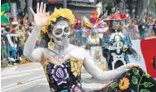  ?? GETTY ?? Skeleton imagery abounds at Mexico City parades during Day of the Dead, a multiday holiday commemorat­ing friends and family members who’ve passed away.