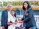  ??  ?? Gimantha Dissanayak­e of NCC Cricket Academy receiving the Best Fielder's award from Madhuri Samuddhika