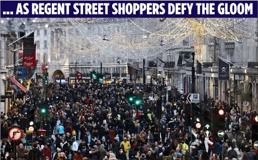  ??  ?? BARGAIN HUNT: Social distancing went out of the window yesterday as Christmas shoppers flocked to Regent Street in London’s West End