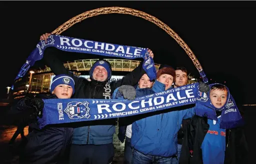  ?? Nick Potts ?? ●●Rochdale fans pose for a photo prior to the Emirates FA Cup, fifth round replay match at Wembley Stadium in February
2018. Dale were among a host of clubs to object to the scrapping of FA Cup replays from next season