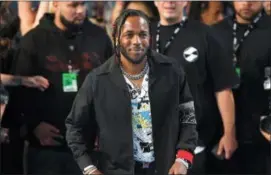  ?? Photos and text from wire services PHOTO BY CHRIS PIZZELLO — INVISION — AP, FILE ?? In this file photo, musician Kendrick Lamar arrives at the MTV Video Music Awards in Inglewood On Monday Lamar won the Pulitzer Prize for music for his album “Damn.”