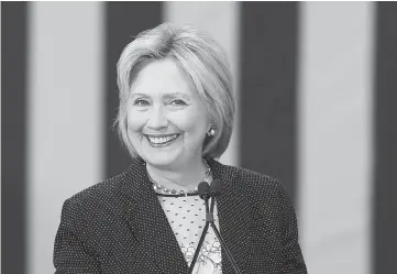  ??  ?? Clinton smiles during a campaign rally in Columbus, Ohio, US recently. — Reuters file photo