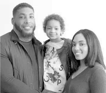  ?? MARK LENNIHAN/ASSOCIATED PRESS ?? In this 2016 file photo, Devon Still and his fiancee Asha Joyce pose with their daughter, Leah, a cancer patient. Still retired from football in December and started a second career trying to help families cope with childhood cancer. Leah is now 7.