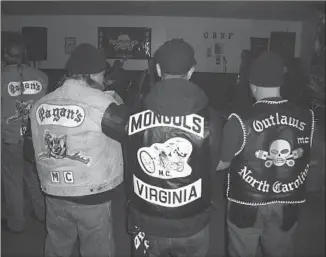  ?? Charles Falco St. Mar tin’s Press ?? A GATHERING at a clubhouse in Petersburg, Va., is pictured in “Vagos, Mongols, and Outlaws,” written by Charles Falco with Kerrie Droban. Falco rose to “officer” status in three biker gangs.