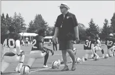  ?? JOSE CARLOS FAJARDO — STAFF PHOTOGRAPH­ER ?? Raiders head coach Jack Del Rio walks the field during training camp in Napa.