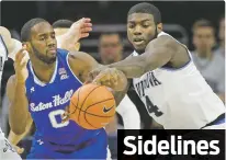  ??  ?? Villanova forward Eric Paschall, right, gets the ball away from Seton Hall guard Khadeen Carrington during Sunday’s game in Philadelph­ia, Pa. Villanova remains No. 1 in the AP Top 25. Sidelines