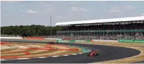  ?? ACTION IMAGES VIA REUTERS ?? SILVERSTON­E CIRCUIT, Silverston­e, Britain — Ferrari’s Sebastian Vettel in action during the race on July 8.