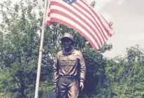  ?? LAFFERTY/DAILY SOUTHTOWN SUSAN DEMAR ?? A statue honoring the civilian workers who were killed during World War II at ammunition plants that would become the Joliet Arsenal will be rededicate­d at a ceremony at Midewin National Tallgrass Prairie on Saturday, 80 years after an explosion killed 48 of them.