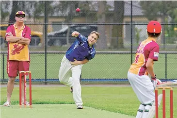  ??  ?? Thomas Wans sends another delivery down the pitch as rain threatened at various times throughout the match.