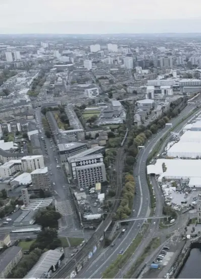  ?? ?? The cluster of conference venues occupies an infilled dockland that once teemed with ships moored five abreast