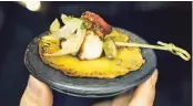  ??  ?? Marc Forgione works magic with rutabaga,
using it as a tortilla for a steak taco.