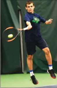  ?? NWA Democrat-Gazette/FLIP PUTTHOFF ?? Eddie Hunter of Haas Hall-Bentonvill­e hits a forehand Tuesday during his 6-2, 6-0 victory over teammate Andrew Schweitzer to claim the Class 2A state boys tennis singles title at the Walton Life Fitness Center in Bentonvill­e.