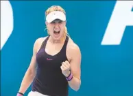  ?? JASON REED / REUTERS ?? Eugenie Bouchard of Canada reacts after her win against Dominika Cibulkova of Slovakia at the Sydney Internatio­nal on Tuesday.