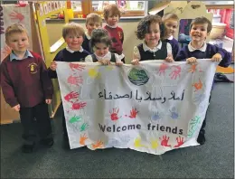  ??  ?? Children from Kinlochlev­en Primary School and nursery have been making banners to give to the Syrian refugee families arriving in the village this spring.