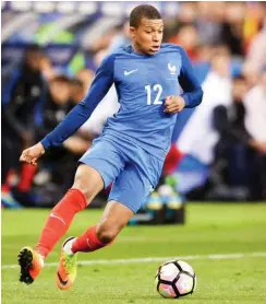  ?? Foto: imago/PanoramiC ?? Mit 18 Jahren schon im Nationaltr­ikot: Monacos Kylian Mbappé