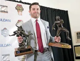  ?? [AP PHOTO] ?? Baker Mayfield won the Davey O’Brien National Quarterbac­k Award and Walter Camp Player of the Year early on Thursday night. By the end of the ceremony, he also won the Maxwell Award for Player of the Year.