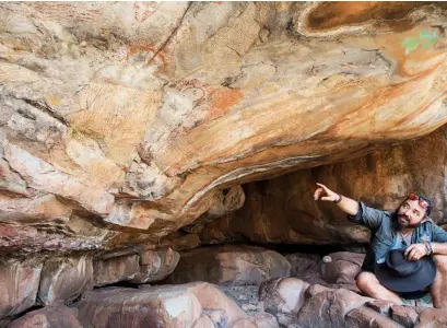  ??  ?? That’s the point( clockwise from top) Duffman points out cave paintings found after a walk from an innocuous turning off the main road; exploring in Tunnel Creek at night, when the wildlife begin to awaken; the striped domes of the Bungle Bungles