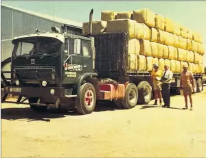  ?? ?? REMEMBERED: Eric and John Kuhne and Ian Mckenzie with wool leaving Wyn Wyn Park shearing shed in 1982. The transport lost its load and had to be re-loaded enroute to Horsham.