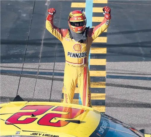  ?? CHRIS GRAYTHEN/GETTY ?? Joey Logano celebrates after winning the NASCAR Cup Series FanShield 500 at Phoenix Raceway on March 8, 2020.