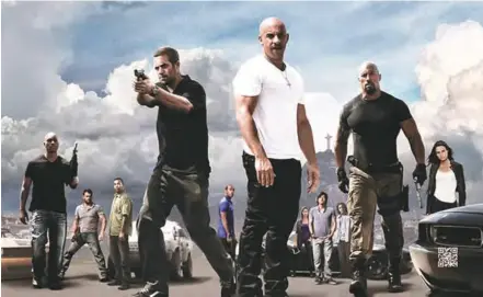  ??  ?? e cast ... A promotiona­l poster of the Fast & Furious movie.