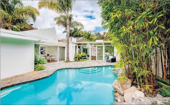  ?? Photograph­s courtesy of Sotheby’s Internatio­nal Realty ?? AFTER QUIETLY SELLING her Beverly Hills estate, Taylor Swift has put this midcentury — on the same street — on the market.