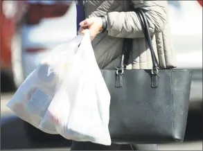  ?? Hearst Connecticu­t Media file photo ?? The legislatur­e’s Environmen­t Committee approved legislatio­n Monday that would ban Connecticu­t stores from giving customers single-use plastic bags starting in January 2020.