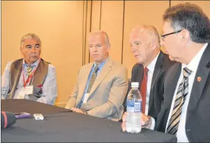  ?? GREG MCNEIL/CAPE BRETON POST ?? From left, Chief Sidney Peters, Nova Scotia Justice Minister Mark Furey, Sydney-Victoria MP Mark Eyking and Senator Dan Christmas. All four spoke during Wednesday’s Truth and Reconcilia­tion symposium in Membertou.