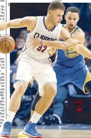  ??  ?? Blake Griffin of the LA Clippers dribbles against Stephen Curry of the Golden State Warriors during the first half at Staples Center in Los Angeles, California.