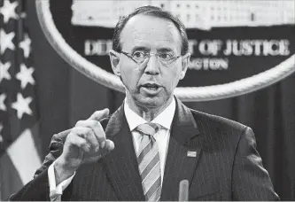  ?? EVAN VUCCI THE ASSOCIATED PRESS ?? Deputy Attorney General Rod Rosenstein announced the indictment of Russian intelligen­ce officers in Washington on Friday. The Russians are accused of harming the presidenti­al election bid of Hillary Clinton.
