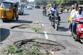  ?? — DECCAN CHRONICLE ?? A BUMPY RIDE: The busy Begumpet main road near Rasulpura circle is filled with potholes and motorists find it difficult to pass through the area. Meanwhile, a congestion free-ride on the 150-feet wide Sardar Patel road still eludes motorists. Though...